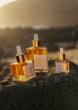 Load image into Gallery viewer, Latitude 21 The Golden Elixir (nourishing olena-kukui glow oil) (1.5 oz, 50 ml value size) https://www.latitude21skin.com/